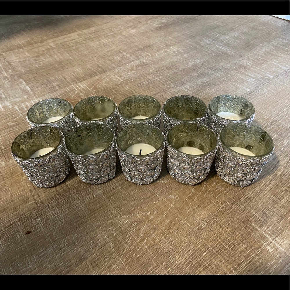 Set of 10 used votive candles.